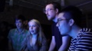 Watch a Room Full of People Cheer on a Giant Video Game Snail